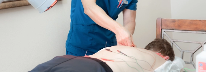 Acupuncture Flower Mound TX Electroacupuncture Acupuncturist Choong Shim performing Electroacupuncture.